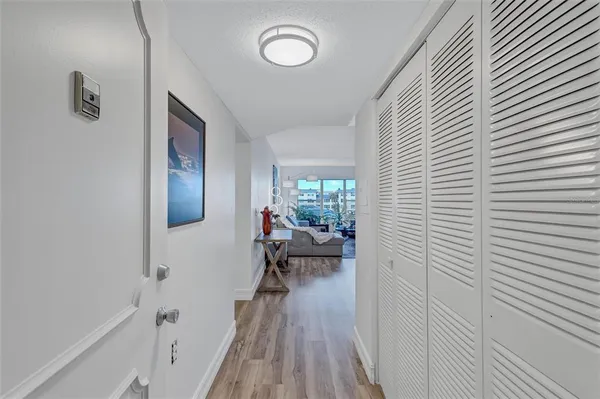 a very nice looking room with wooden floor