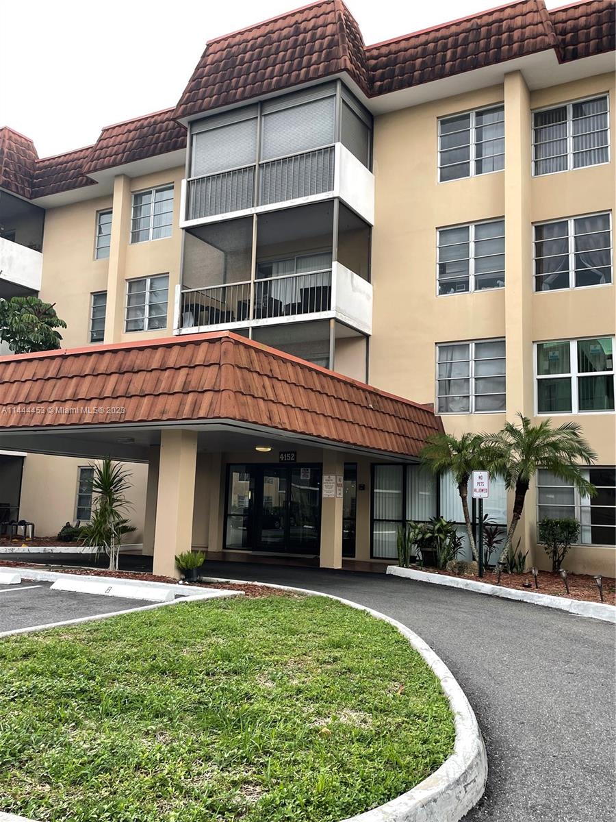 Inverrary Lauderhill, FL 33319 - Photo 20 of 23 a view of a building with a garden