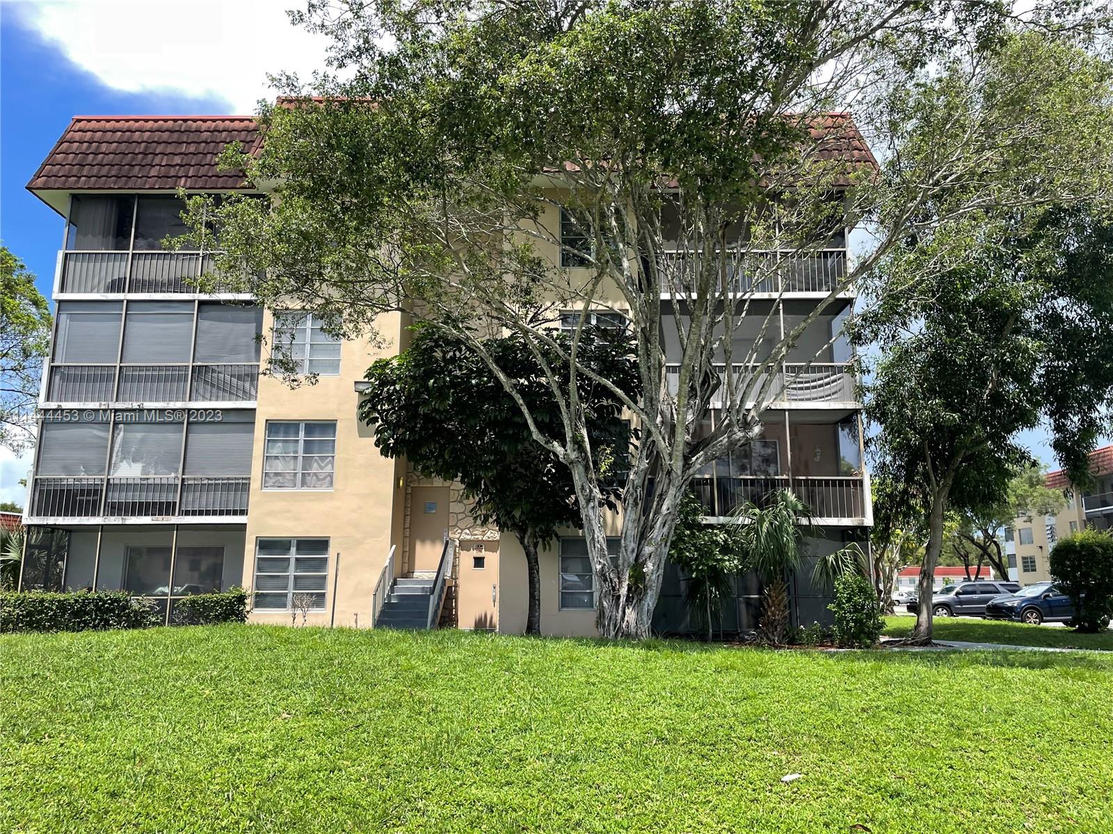 Inverrary Lauderhill, FL 33319 - Photo 21 of 23 a view of a house with a yard