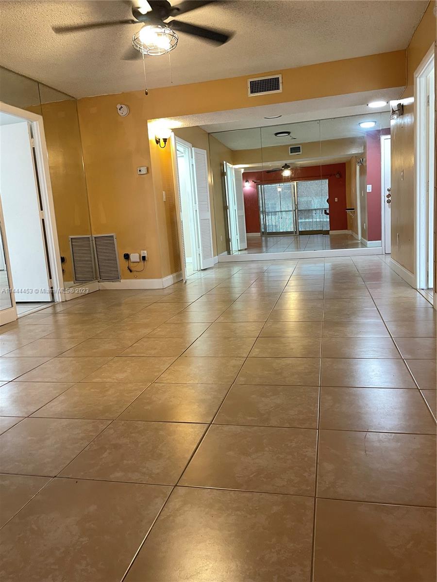 Inverrary Lauderhill, FL 33319 - Photo 7 of 23 a view of a hallway with an empty space