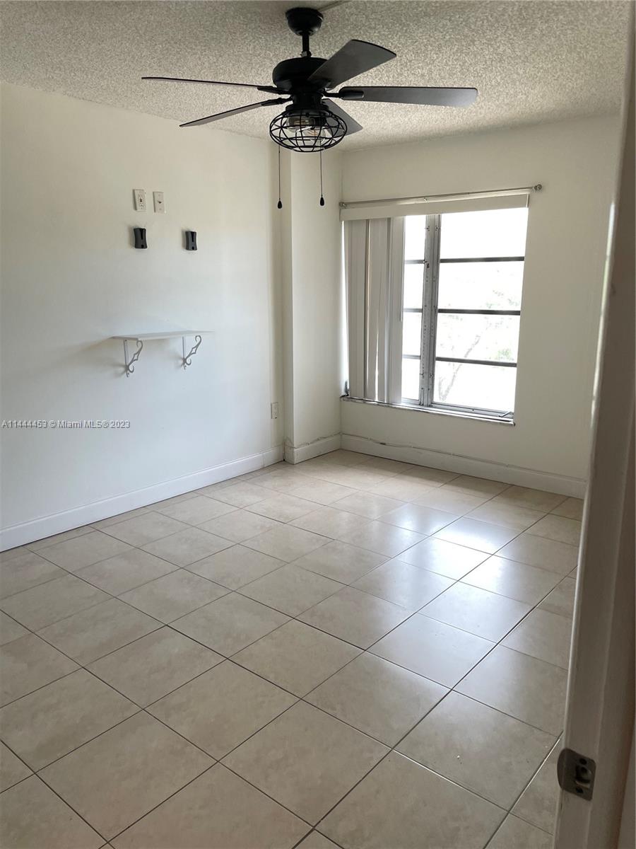 Inverrary Lauderhill, FL 33319 - Photo 10 of 23 a view of an empty room and a window