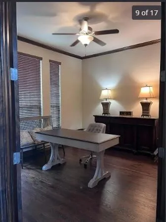 a room with a table chairs and wooden floor