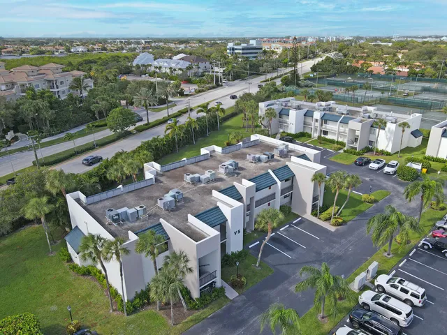 an aerial view of a house with a garden