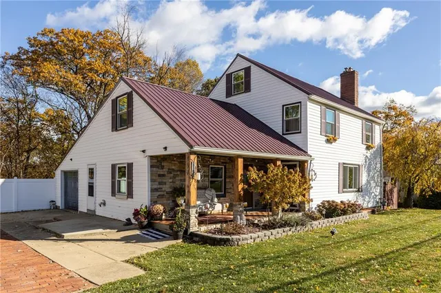 front view of a house with a patio