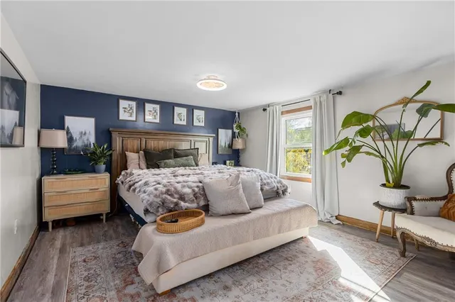 a bedroom with furniture and a couch