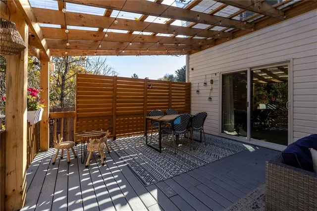 a patio with table and chairs