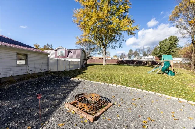 a view of a backyard with a garden