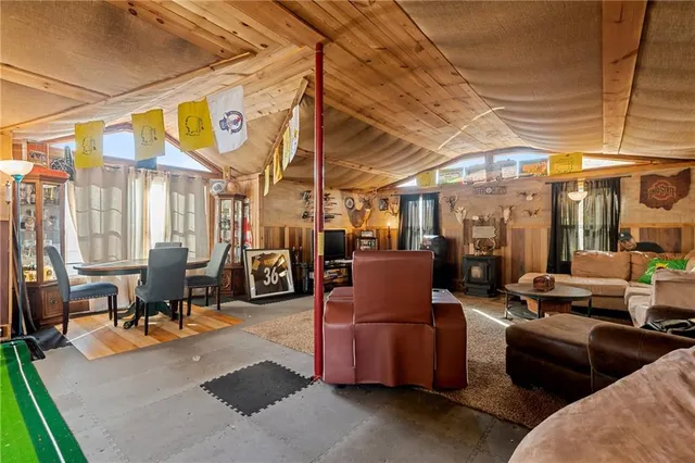 a view of living room filled with furniture