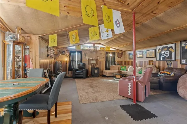 a view of a patio with a table and chairs