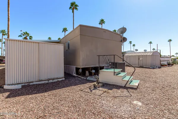 a house view with a backyard space
