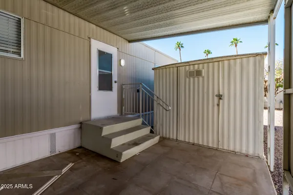 a view of a hallway with staircase