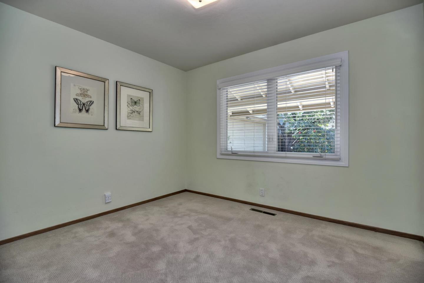 12338 Brookglen Drive Saratoga, CA 95070 - Photo 12 of 18 a view of an empty room with a window