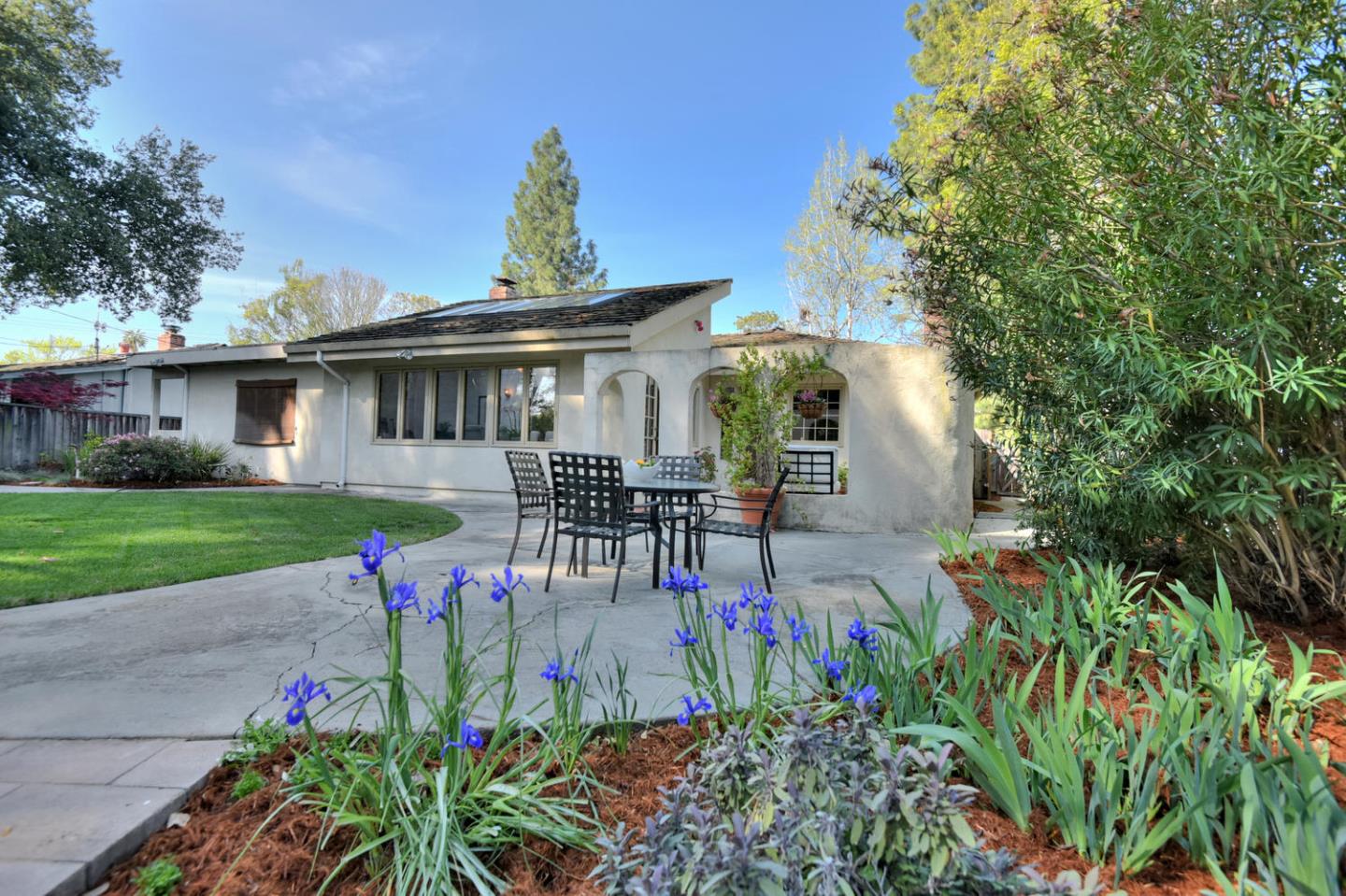 12338 Brookglen Drive Saratoga, CA 95070 - Photo 15 of 18 a view of a house with a yard and sitting area