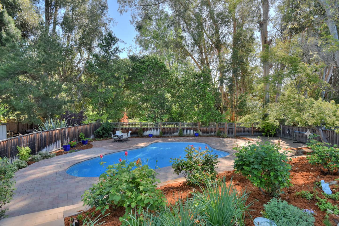 12338 Brookglen Drive Saratoga, CA 95070 - Photo 16 of 18 a view of yard with swimming pool and sitting area