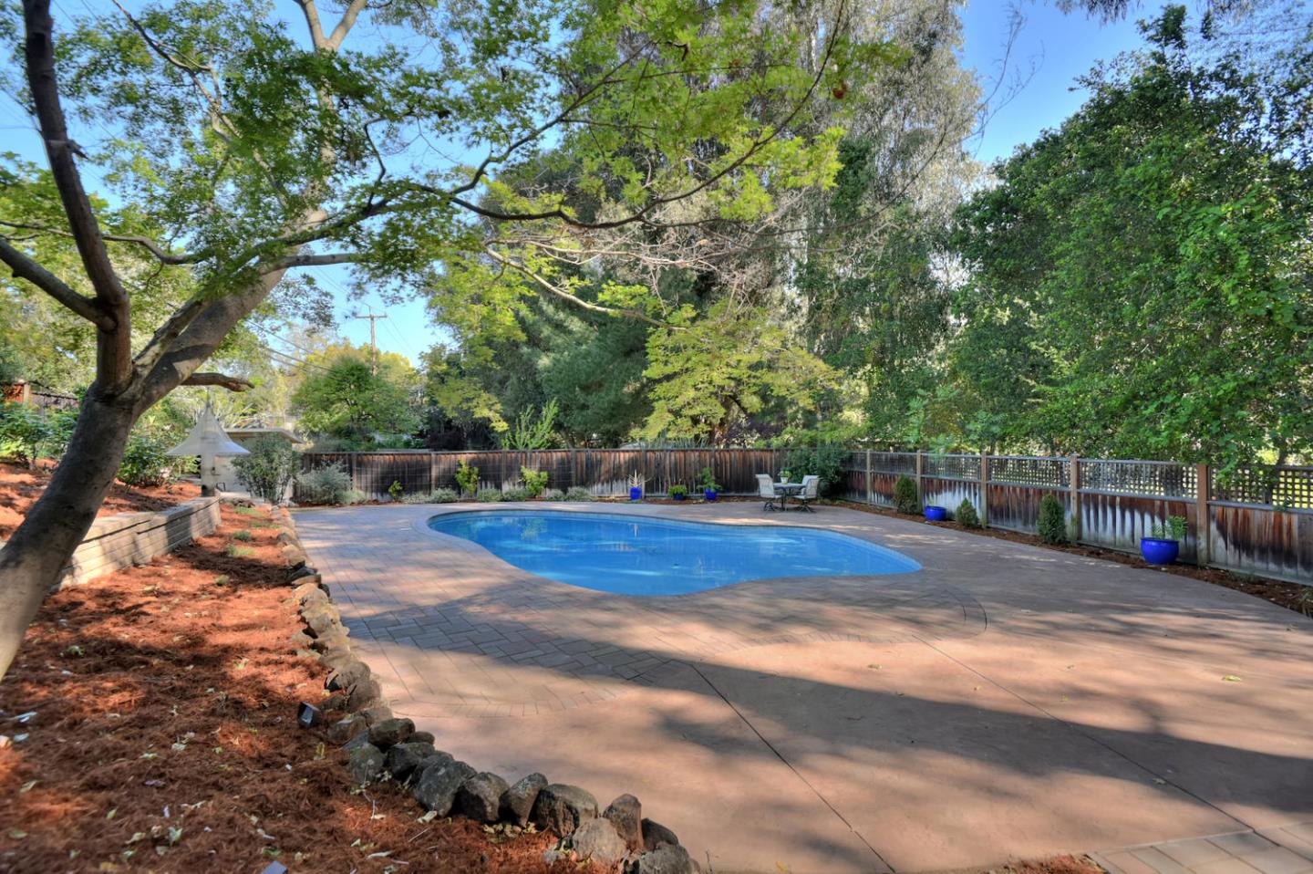 12338 Brookglen Drive Saratoga, CA 95070 - Photo 17 of 18 a view of backyard of house with green space