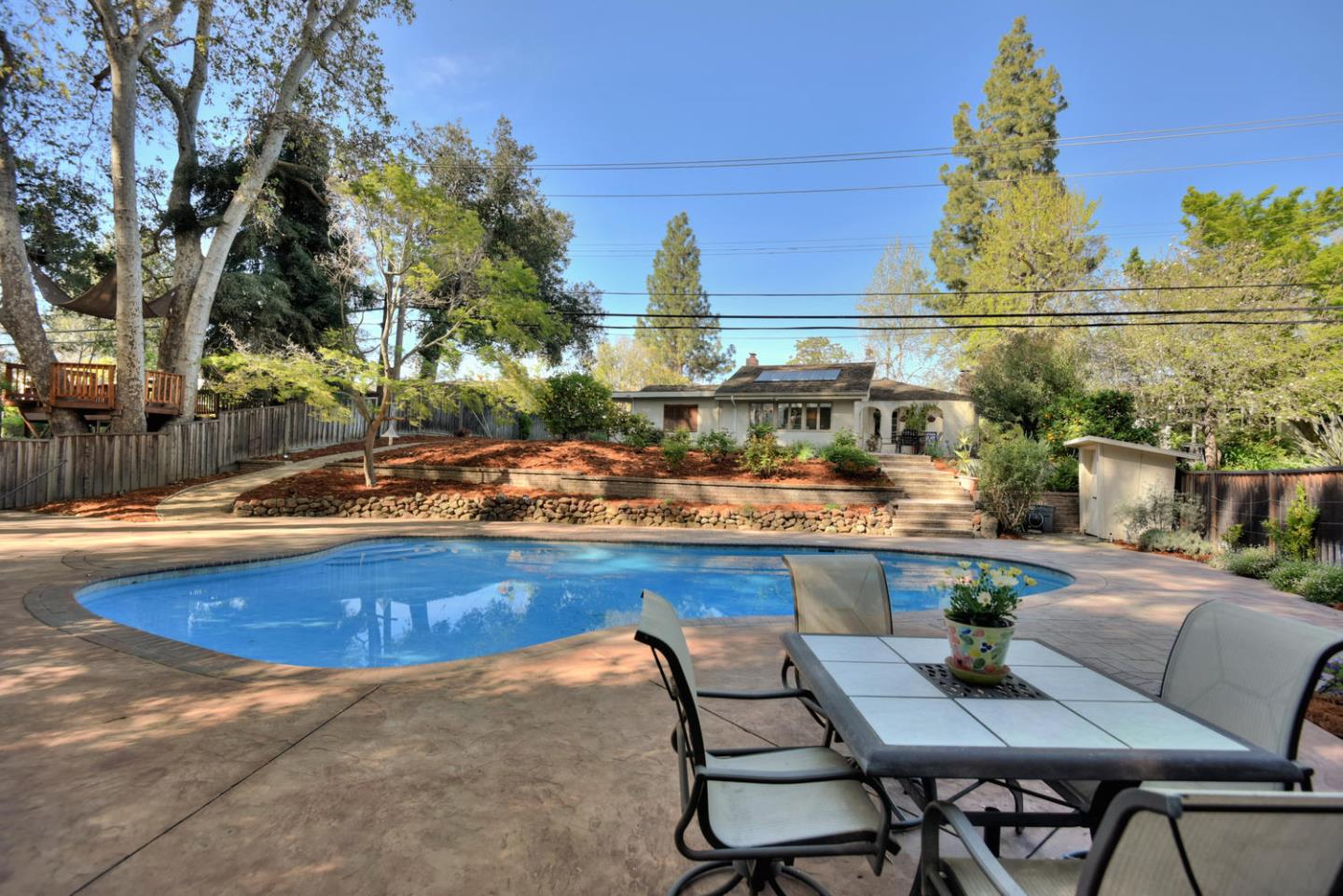 12338 Brookglen Drive Saratoga, CA 95070 - Photo 18 of 18 a view of swimming pool with outdoor seating and yard