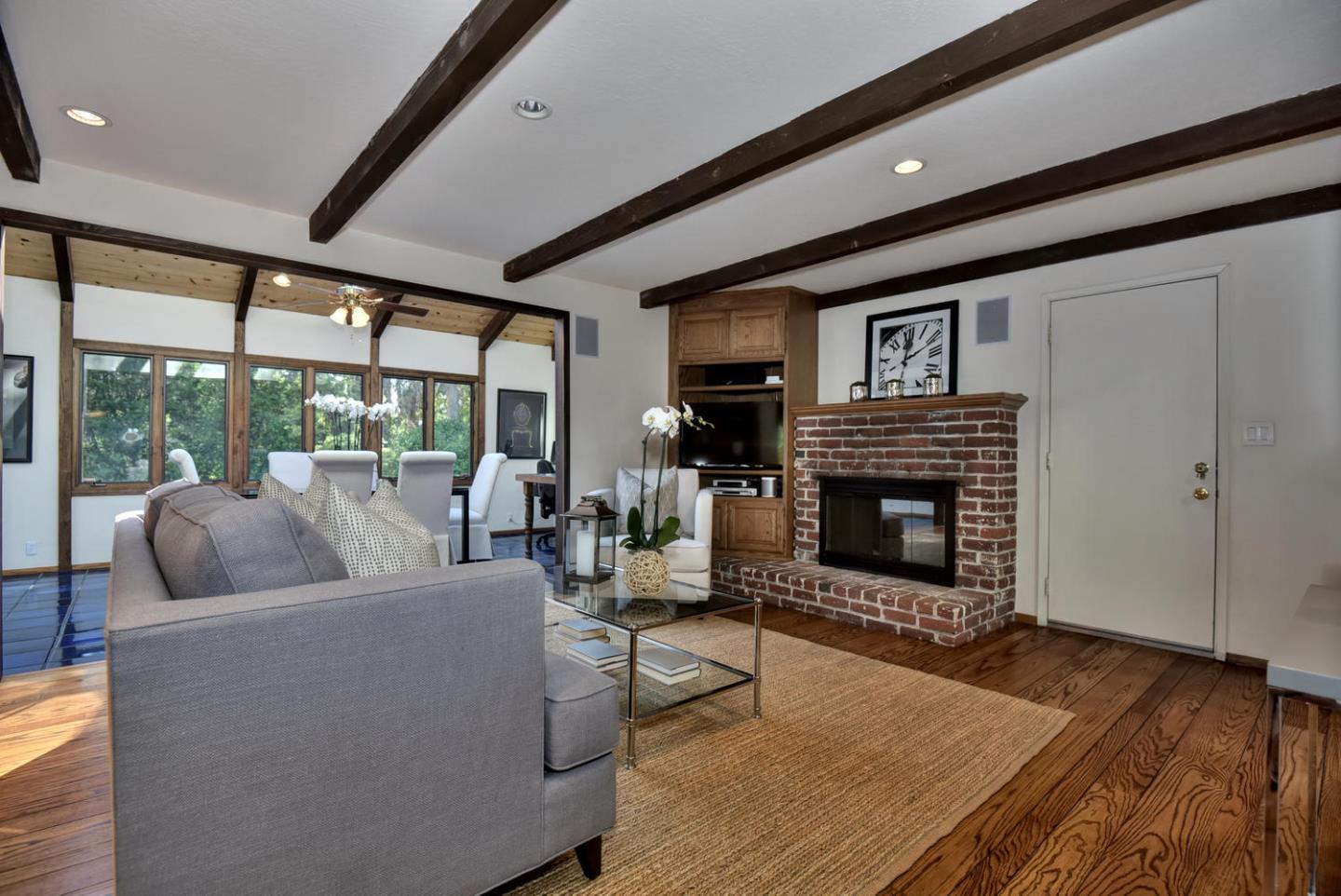12338 Brookglen Drive Saratoga, CA 95070 - Photo 7 of 18 a living room with furniture and a fireplace