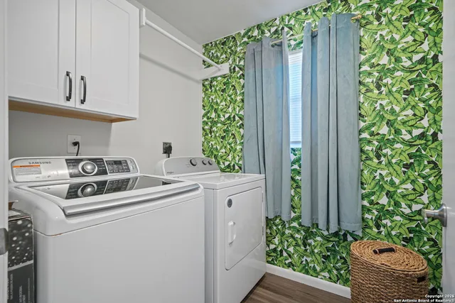 a utility room with dryer and washer