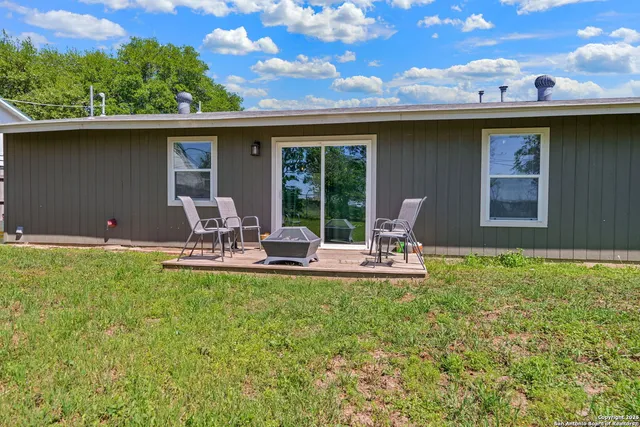 a house view with a garden space
