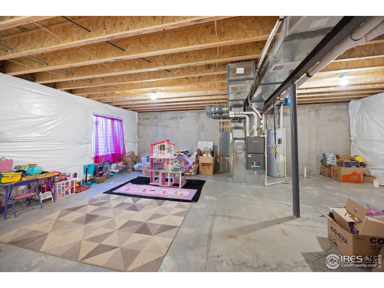 4355 24th Street Road, Unit 3404 Greeley, CO 80634 - Photo 32 of 36 Unfinished basement with rough-ins