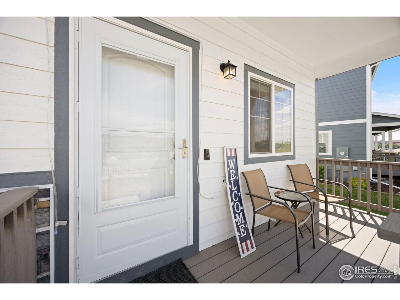 4355 24th Street Road, Unit 3404 Greeley, CO 80634 - Photo 4 of 36 Covered front entry with small sitting area.