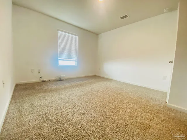 an empty room with a natural light