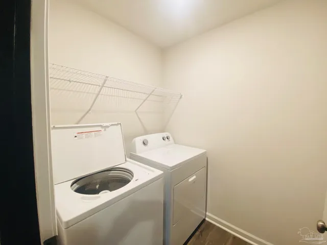 a utility room with dryer and washer