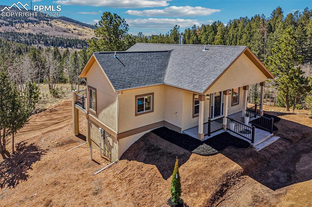 507 Yorktown Road Cripple Creek, CO 80813 - Photo 1 of 50 a aerial view of a house with a yard