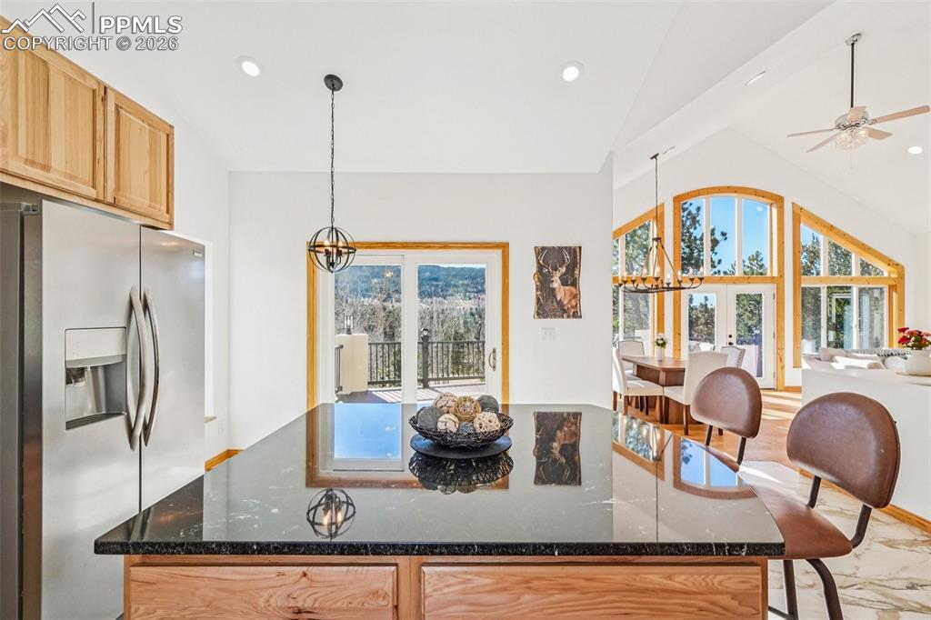 507 Yorktown Road Cripple Creek, CO 80813 - Photo 20 of 50 a view of kitchen with furniture and large window