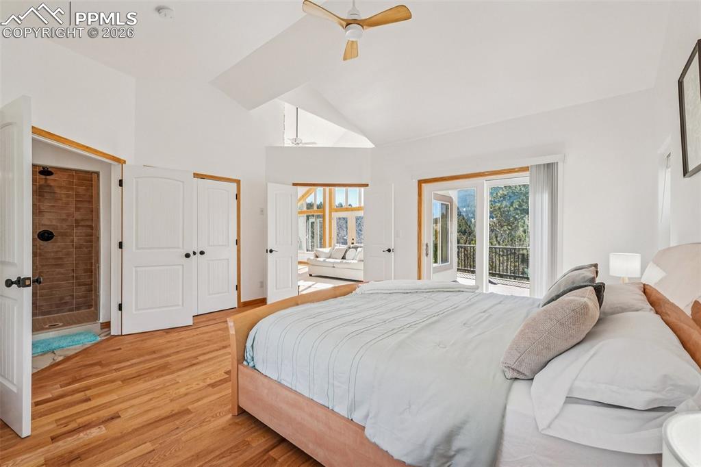 507 Yorktown Road Cripple Creek, CO 80813 - Photo 23 of 50 a bedroom with a bed and a large window