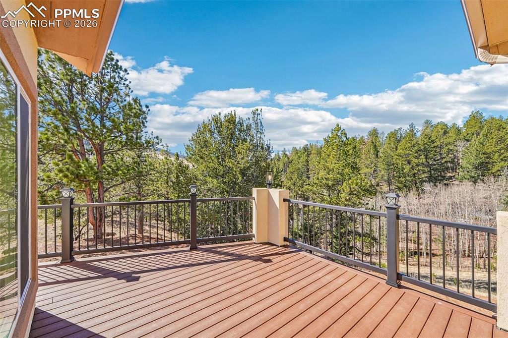 507 Yorktown Road Cripple Creek, CO 80813 - Photo 39 of 50 a view of a balcony with wooden floor
