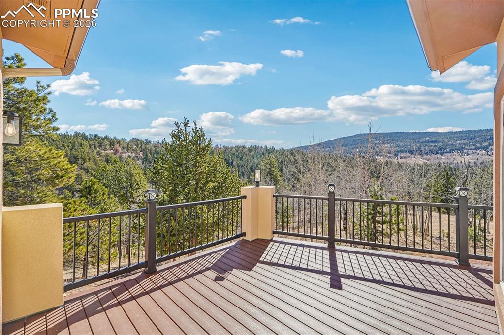 507 Yorktown Road Cripple Creek, CO 80813 - Photo 40 of 50 a view of a balcony with wooden floor