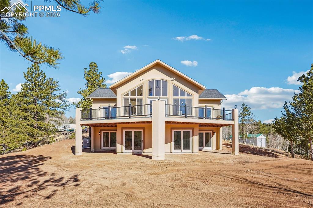 507 Yorktown Road Cripple Creek, CO 80813 - Photo 43 of 50 a front view of a house with a yard