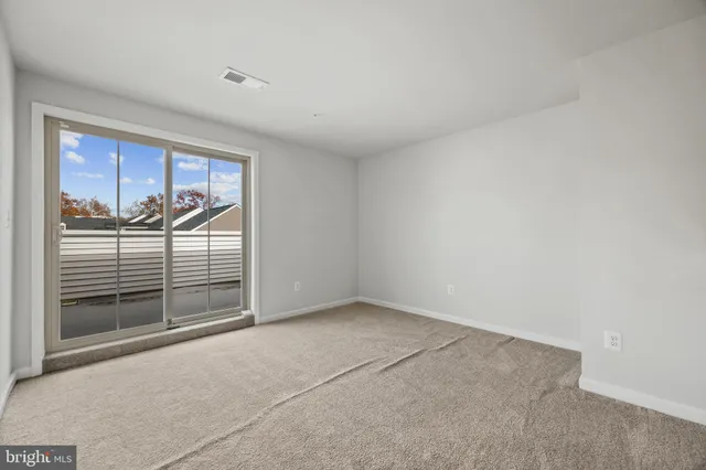 a view of a livingroom with a staircase