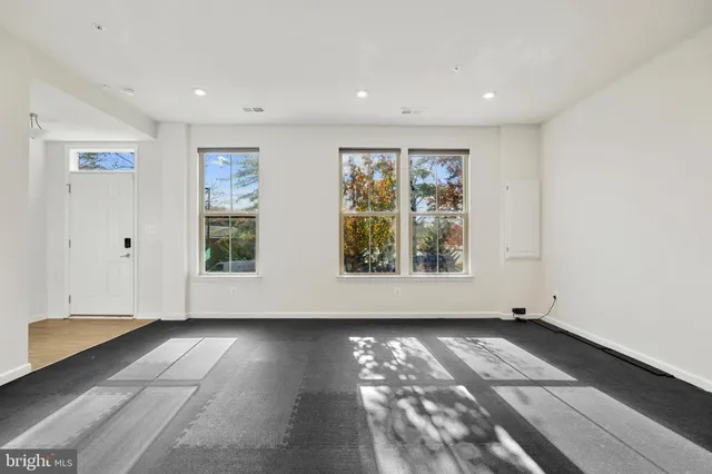 an empty room with windows