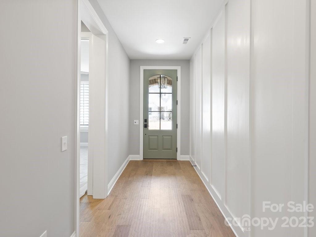 14839 Laura Michelle Road, Unit 66 Huntersville, NC 28078 - Photo 6 of 42 a view of entryway with wooden floor