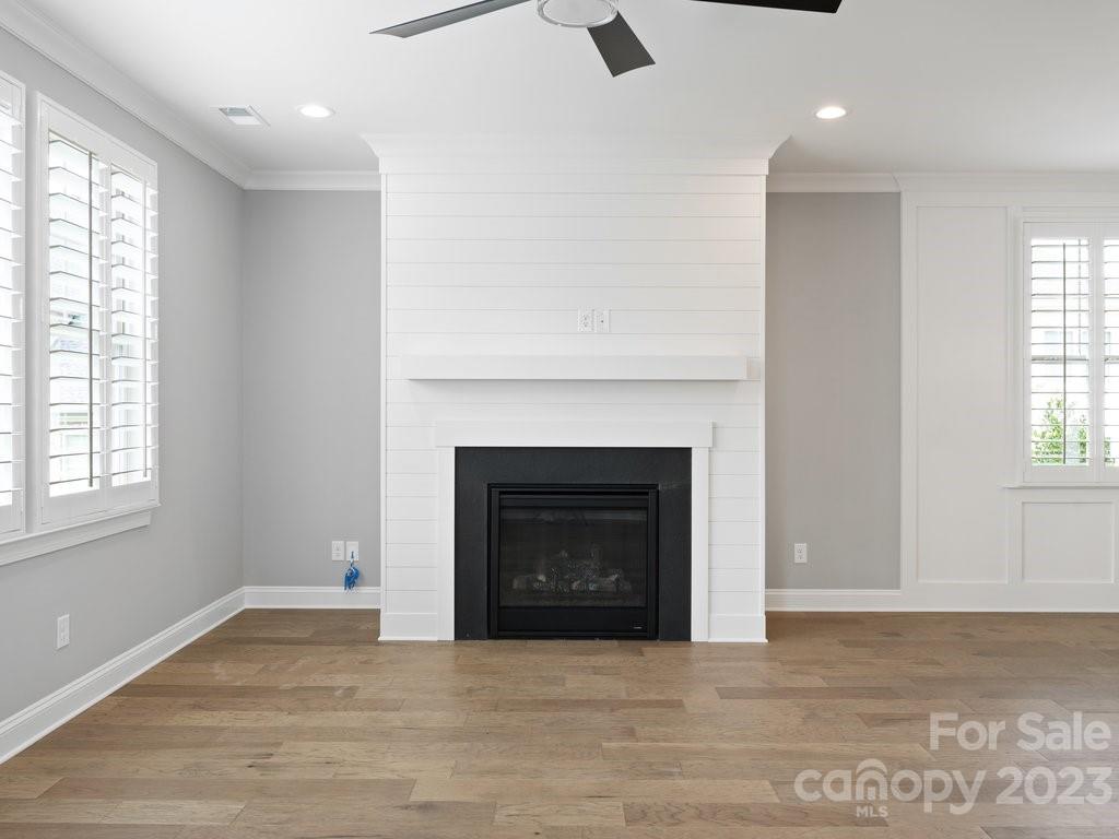 14839 Laura Michelle Road, Unit 66 Huntersville, NC 28078 - Photo 9 of 42 a view of an empty room with window and fireplace