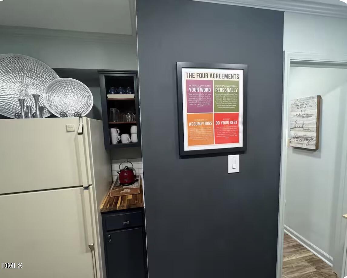6369 New Market Way Raleigh, NC 27615 - Photo 4 of 14 a room with storage and utility