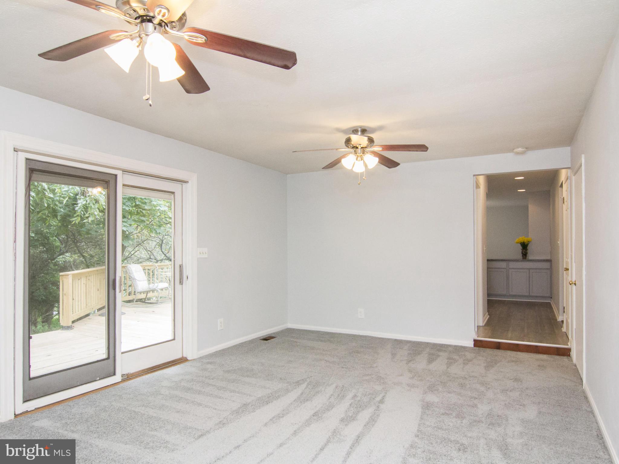 3923 London Bridge Road Finksburg, MD 21048 - Photo 11 of 30 Family Room with Slider to Deck