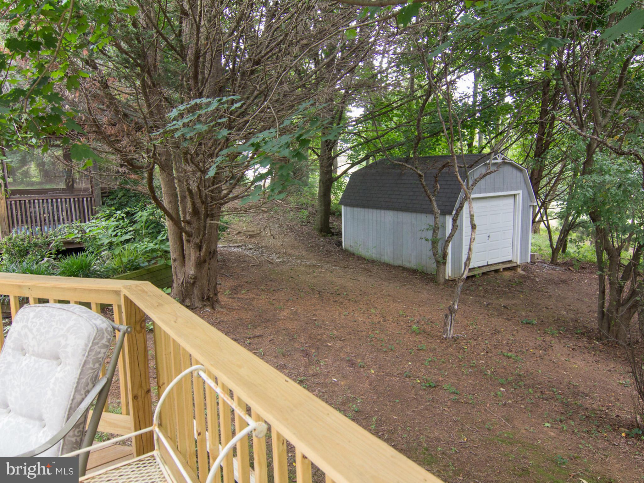 3923 London Bridge Road Finksburg, MD 21048 - Photo 19 of 30 Shed in Wooded Backyard