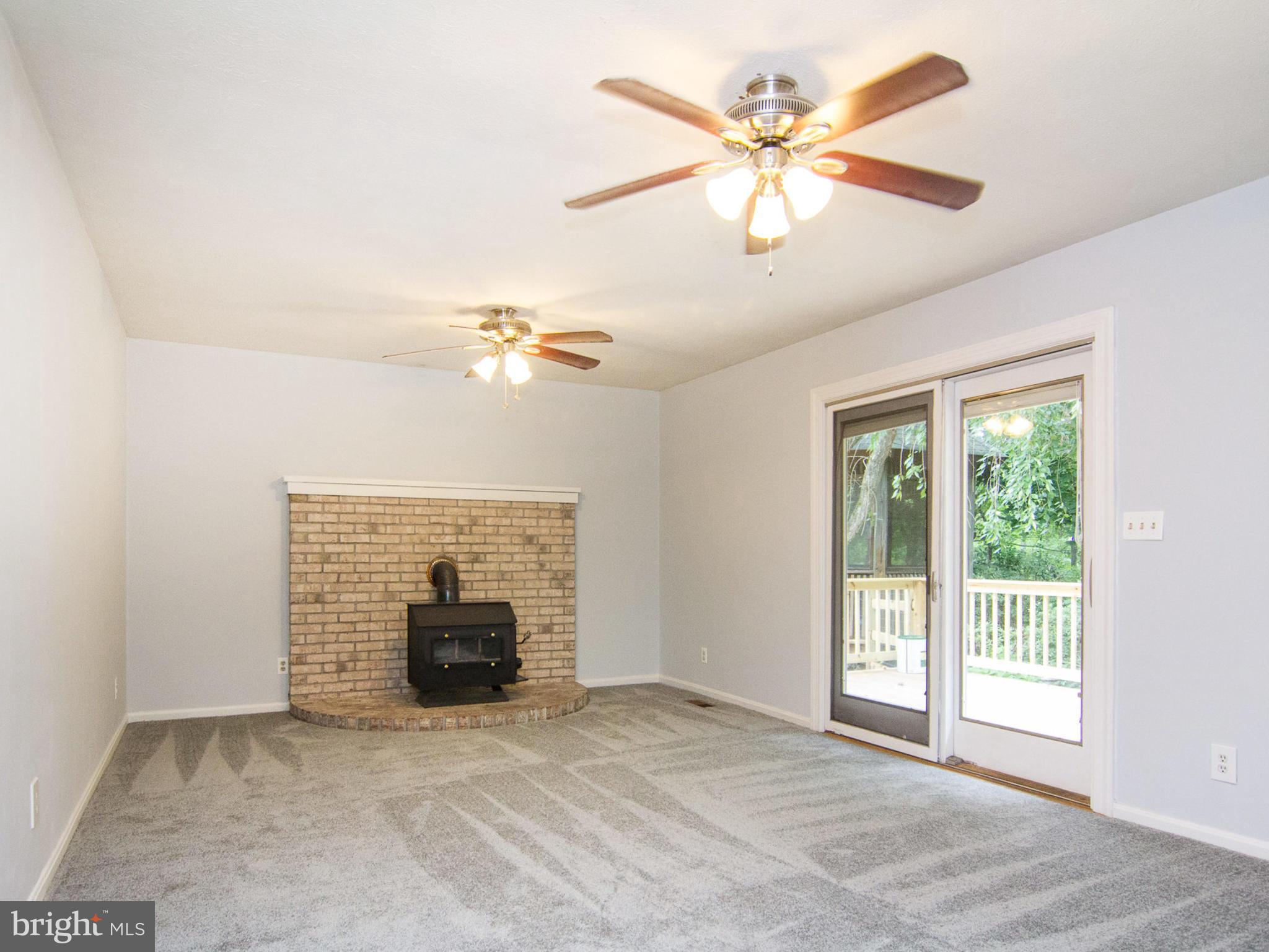 3923 London Bridge Road Finksburg, MD 21048 - Photo 10 of 30 Family Room with Wood Stove