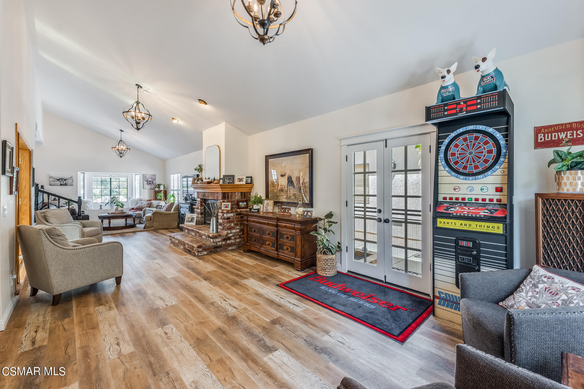 5765 Oak Knolls Road Simi Valley, CA 93063 - Photo 12 of 71 a living room with furniture and a table
