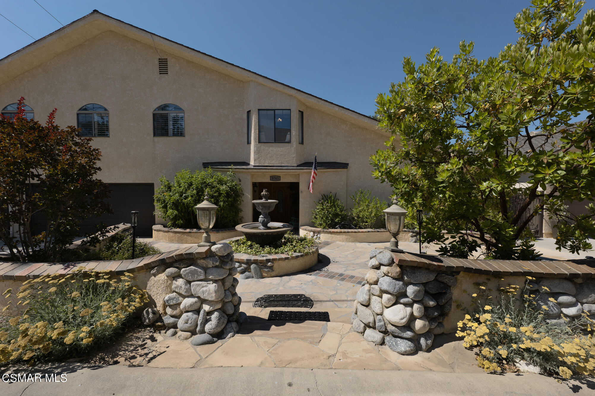 5765 Oak Knolls Road Simi Valley, CA 93063 - Photo 2 of 71 a view of a house with backyard sitting area and swimming pool
