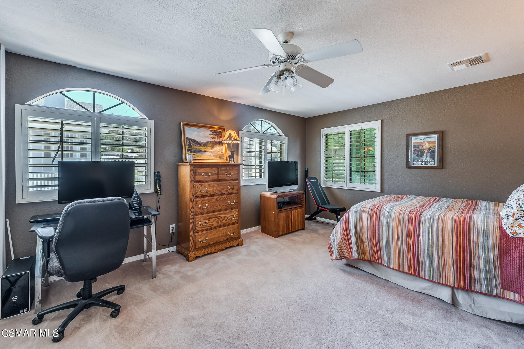 5765 Oak Knolls Road Simi Valley, CA 93063 - Photo 36 of 71 a bedroom with furniture and a window