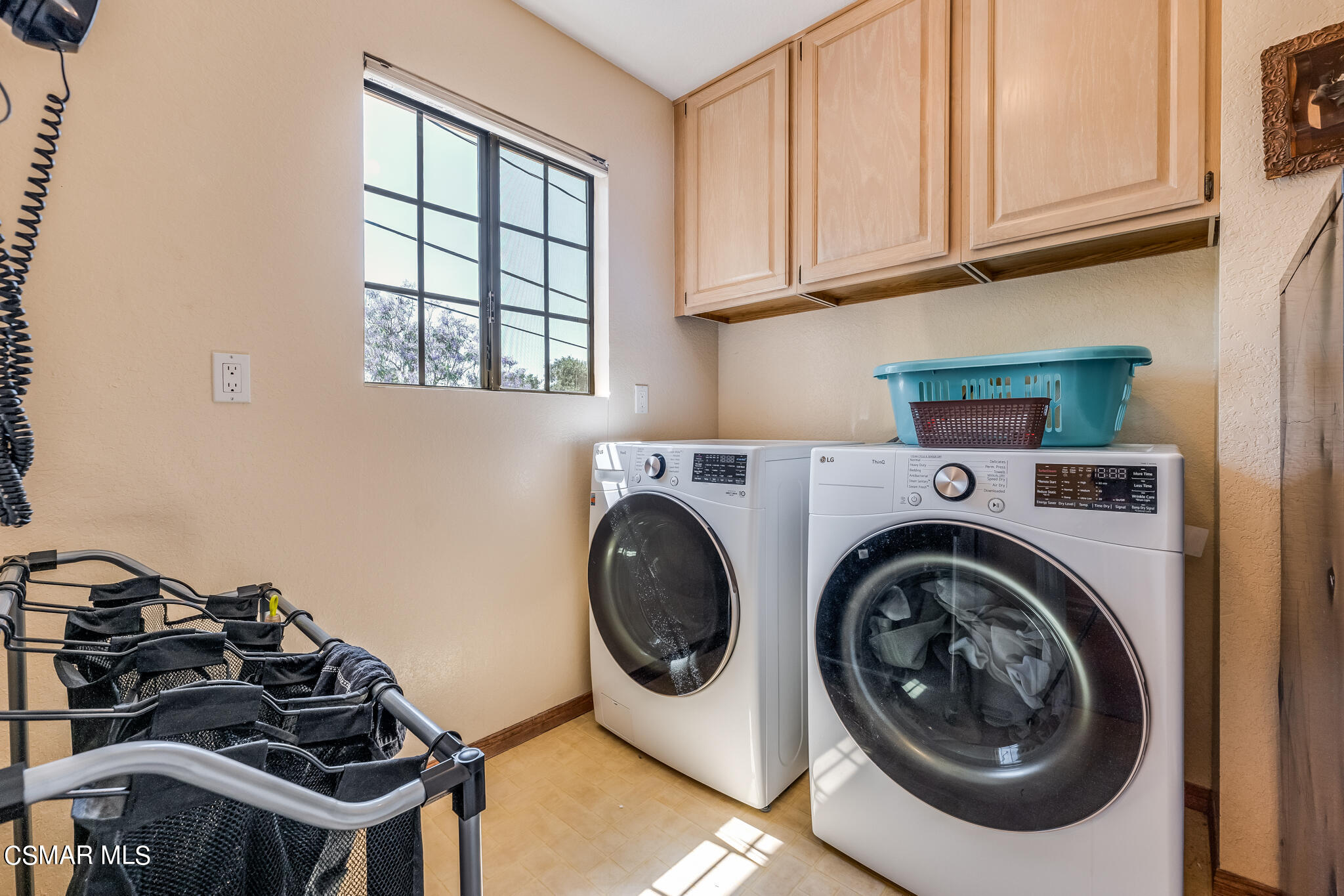 5765 Oak Knolls Road Simi Valley, CA 93063 - Photo 38 of 71 a utility room with sink dryer and washer