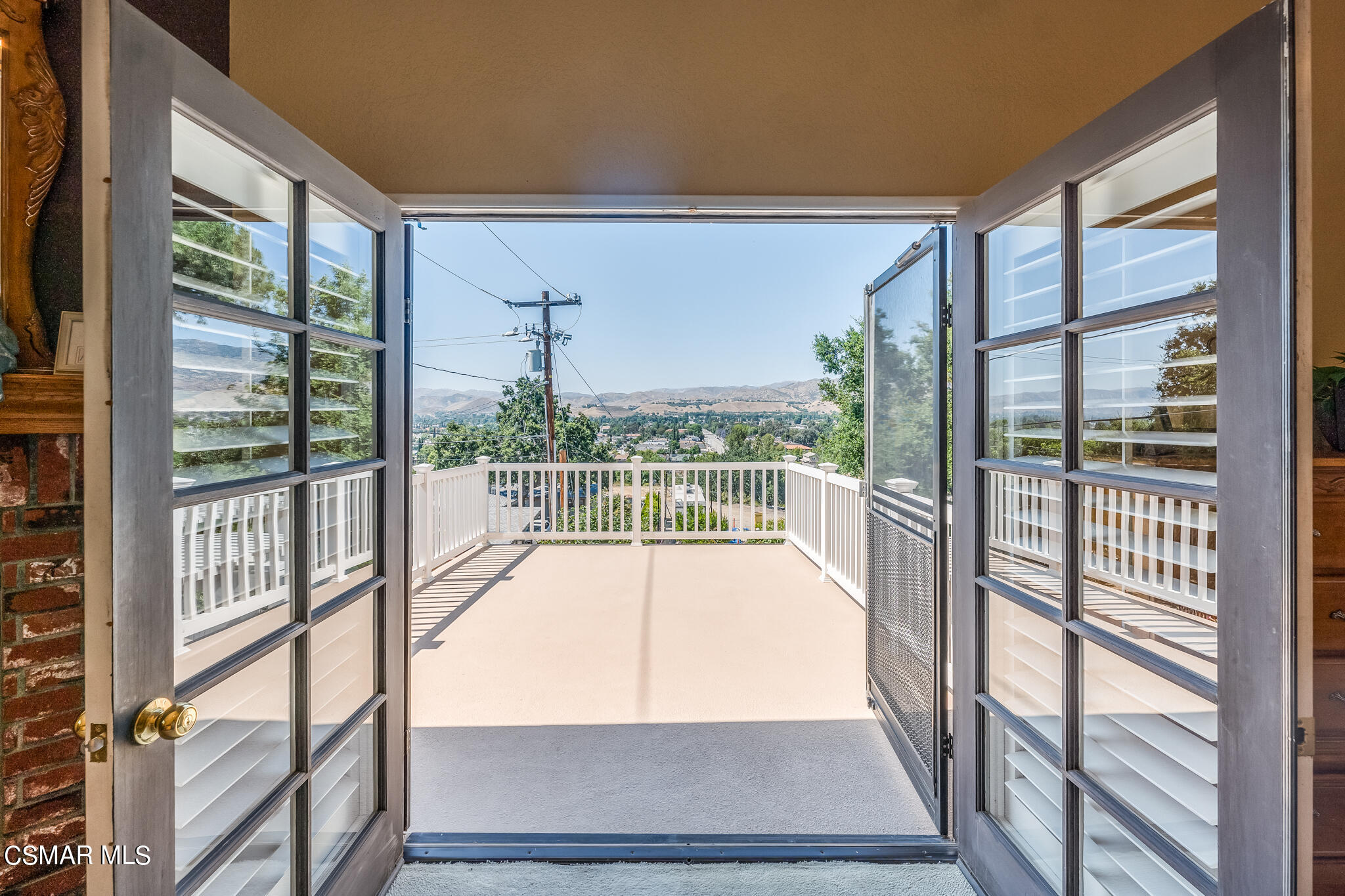 5765 Oak Knolls Road Simi Valley, CA 93063 - Photo 49 of 71 a view of a room with wooden floor and windows
