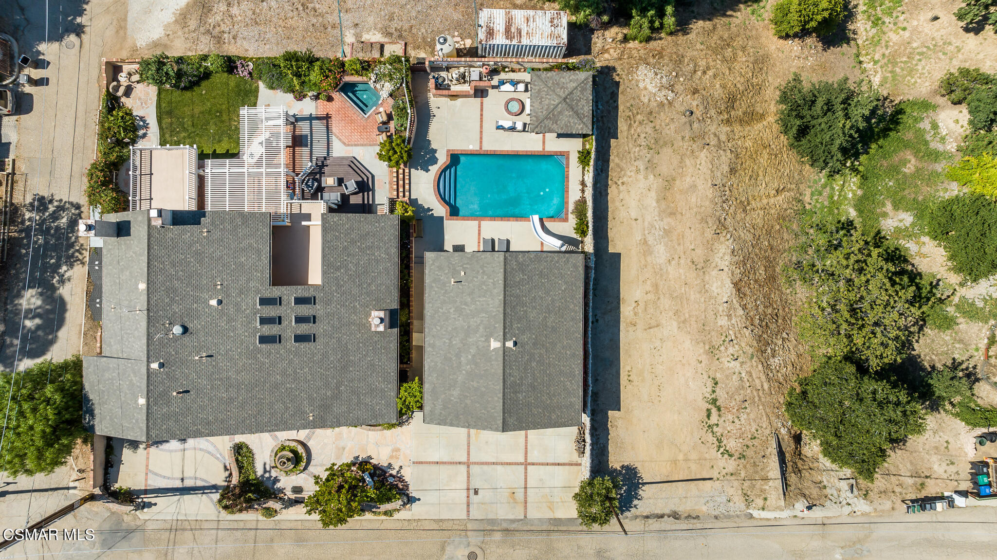 5765 Oak Knolls Road Simi Valley, CA 93063 - Photo 6 of 71 aerial view of a house with a outdoor space