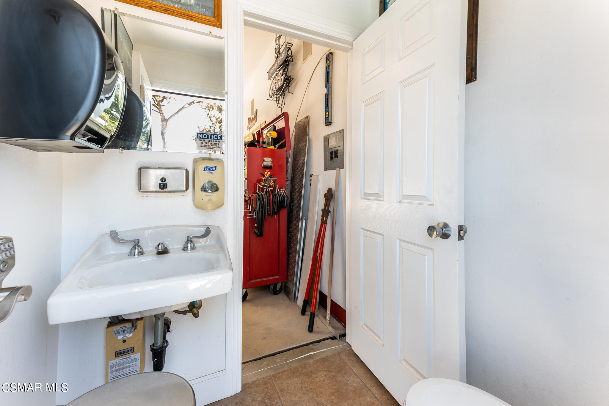 5765 Oak Knolls Road Simi Valley, CA 93063 - Photo 71 of 71 a bathroom with a sink toilet and shower
