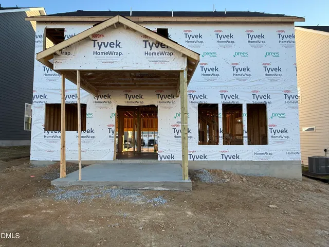 a view of porch with wooden floor