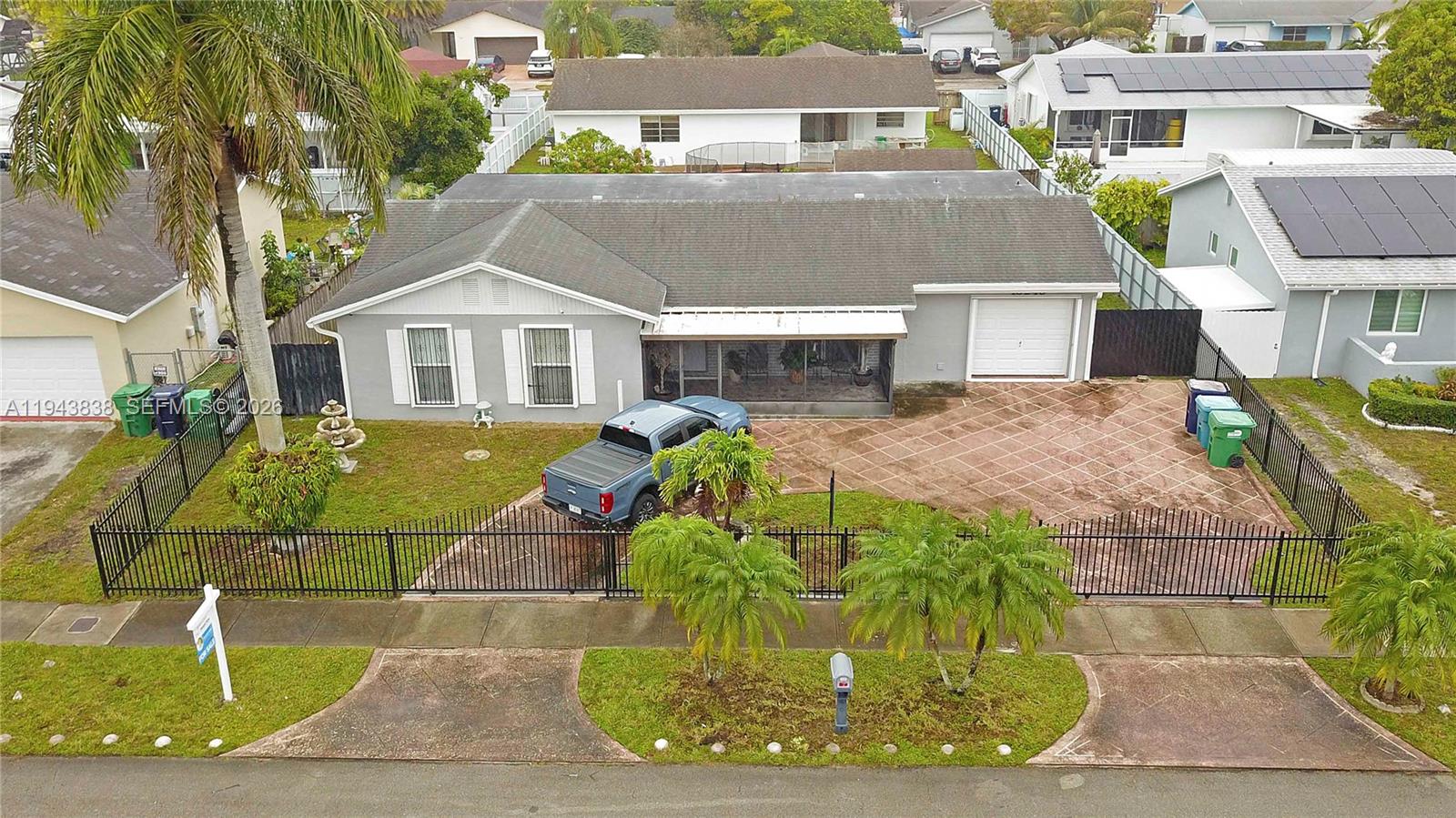 13243 Southwest 258th Terrace Homestead, FL 33032 - Photo 1 of 25 a view of a big building